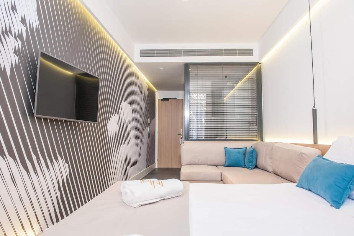 Ropa de cama de alta calidad y minibar