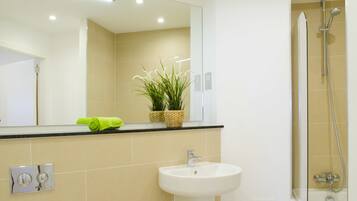 Bathtub, hair dryer, towels