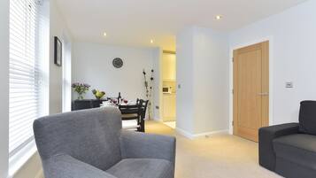 Apartment, 1 Bedroom | Living area | Flat-screen TV