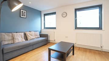 Apartment, 3 Bedrooms | Living area | Flat-screen TV