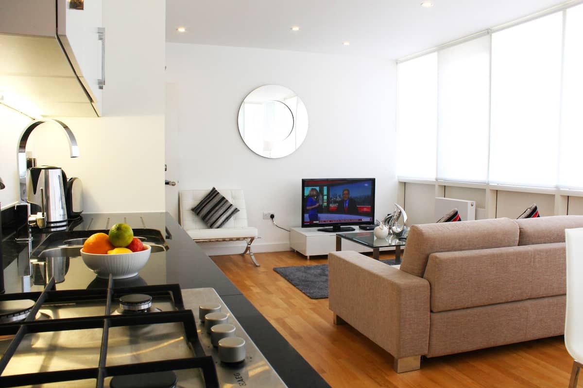 Apartment, 2 Bedrooms | Living area | Flat-screen TV, DVD player