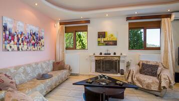 Villa, 3 Bedrooms, Private Pool (Anna) | Living area | 32-inch flat-screen TV with cable channels, TV, fireplace