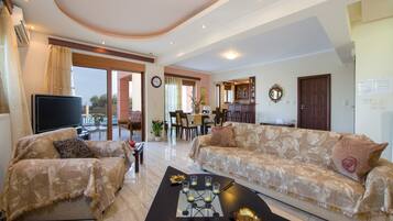 Villa, 3 Bedrooms, Private Pool (Anna) | Living area | 32-inch flat-screen TV with cable channels, TV, fireplace