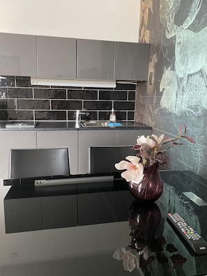 Superior Suite, 1 Bedroom, Ocean View | Private kitchen | Fridge, highchair - Strand City Hotell (Ornskoldsvik)