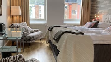 Superior Suite, 1 Bedroom, Ocean View | Living area | Flat-screen TV