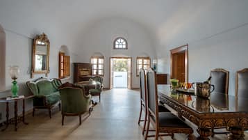 Grand Apartment, Jetted Tub | Living room | Flat-screen TV