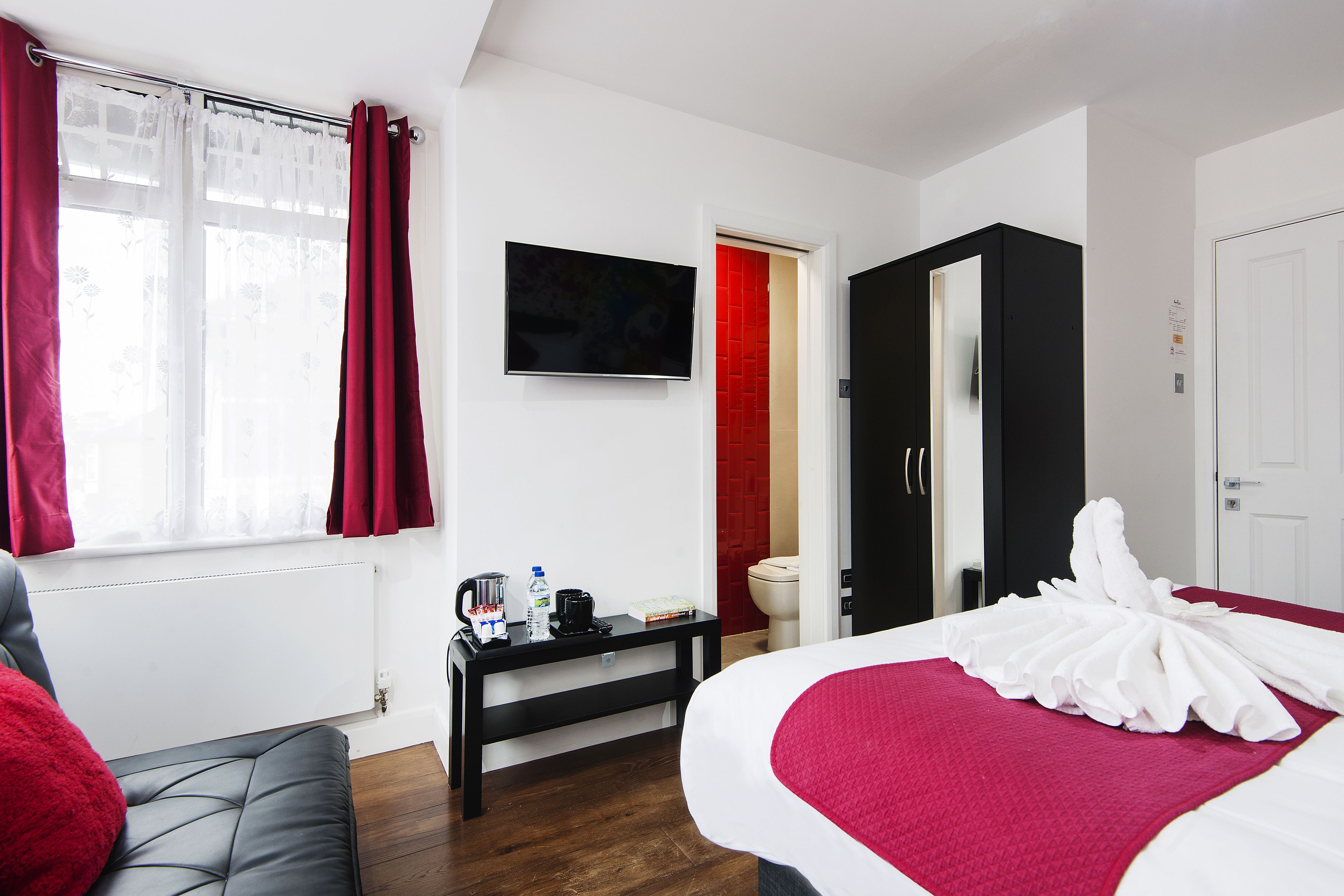 deluxe triple room, multiple beds | iron/ironing board, free wifi, bed sheets