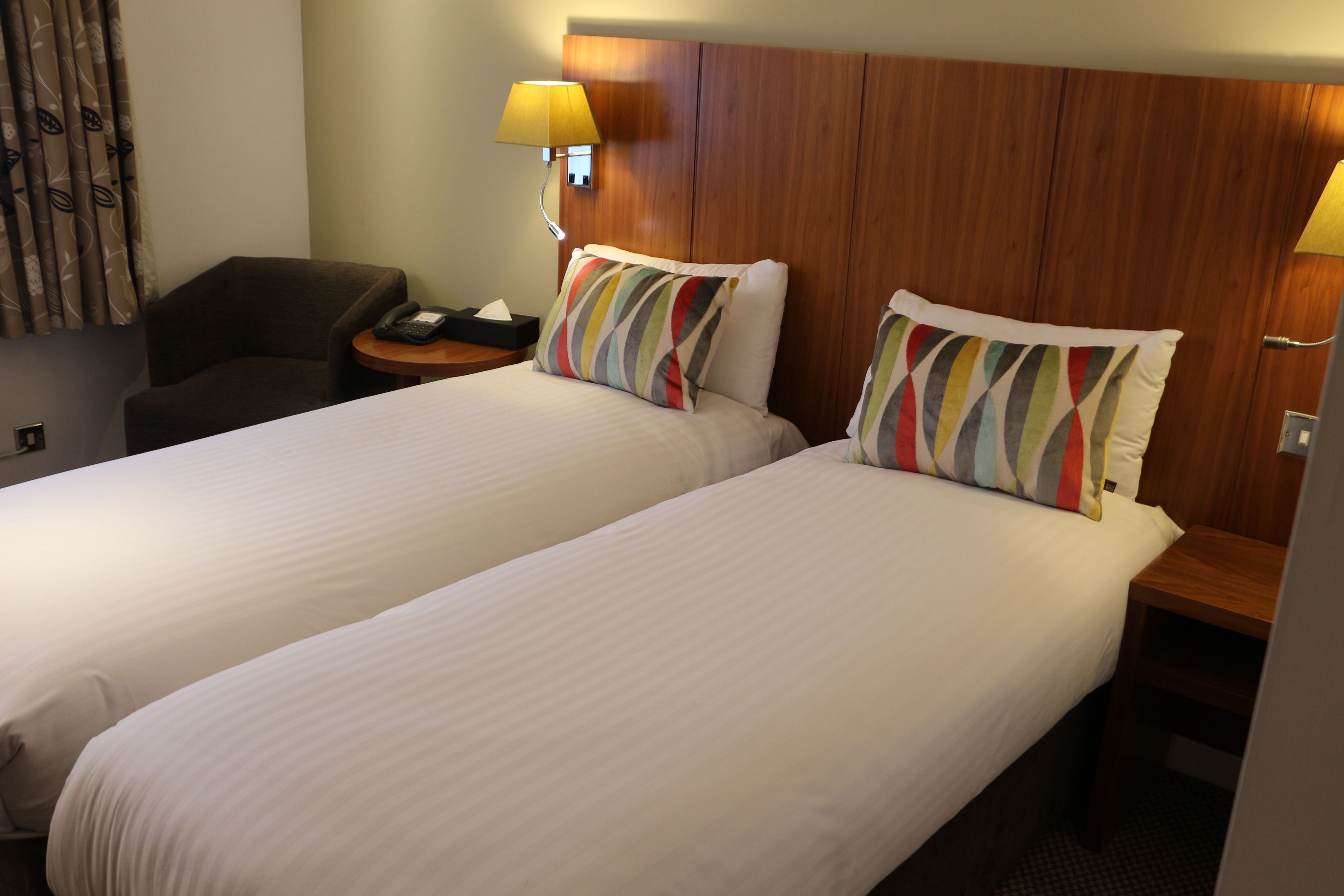 standard twin room | in-room safe, desk, laptop workspace, soundproofing