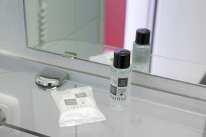 Shower, free toiletries, hair dryer, towels