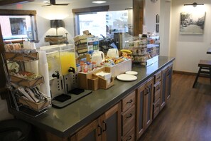 Enjoy a convenient breakfast with a variety of options, including cereal, fruits, and hot beverages.