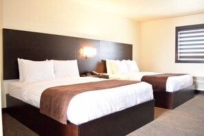 Premium bedding, desk, laptop workspace, iron/ironing board