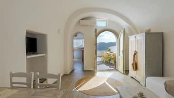 Earth House Volcano View | Living area | 31-inch flat-screen TV with satellite channels, plasma TV