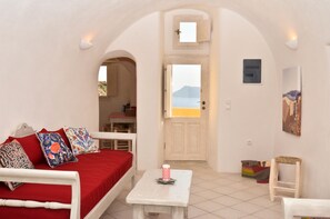 Superior Apartment, 1 Bedroom (Lava House) | Living area | 31-inch flat-screen TV with satellite channels, plasma TV - Just Blue (Santorini)