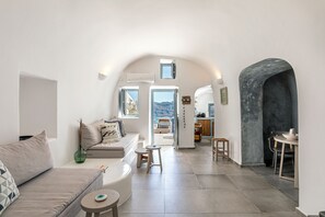 Honeymoon Villa | Living area | 31-inch flat-screen TV with satellite channels, plasma TV - Just Blue (Santorini)