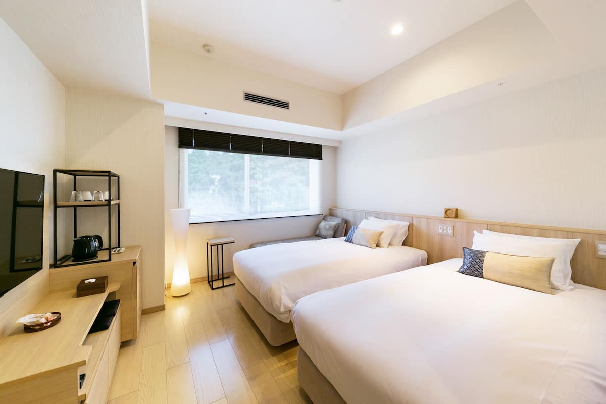 Twin Room, Non Smoking (Casual) | In-room safe, free WiFi, bed sheets