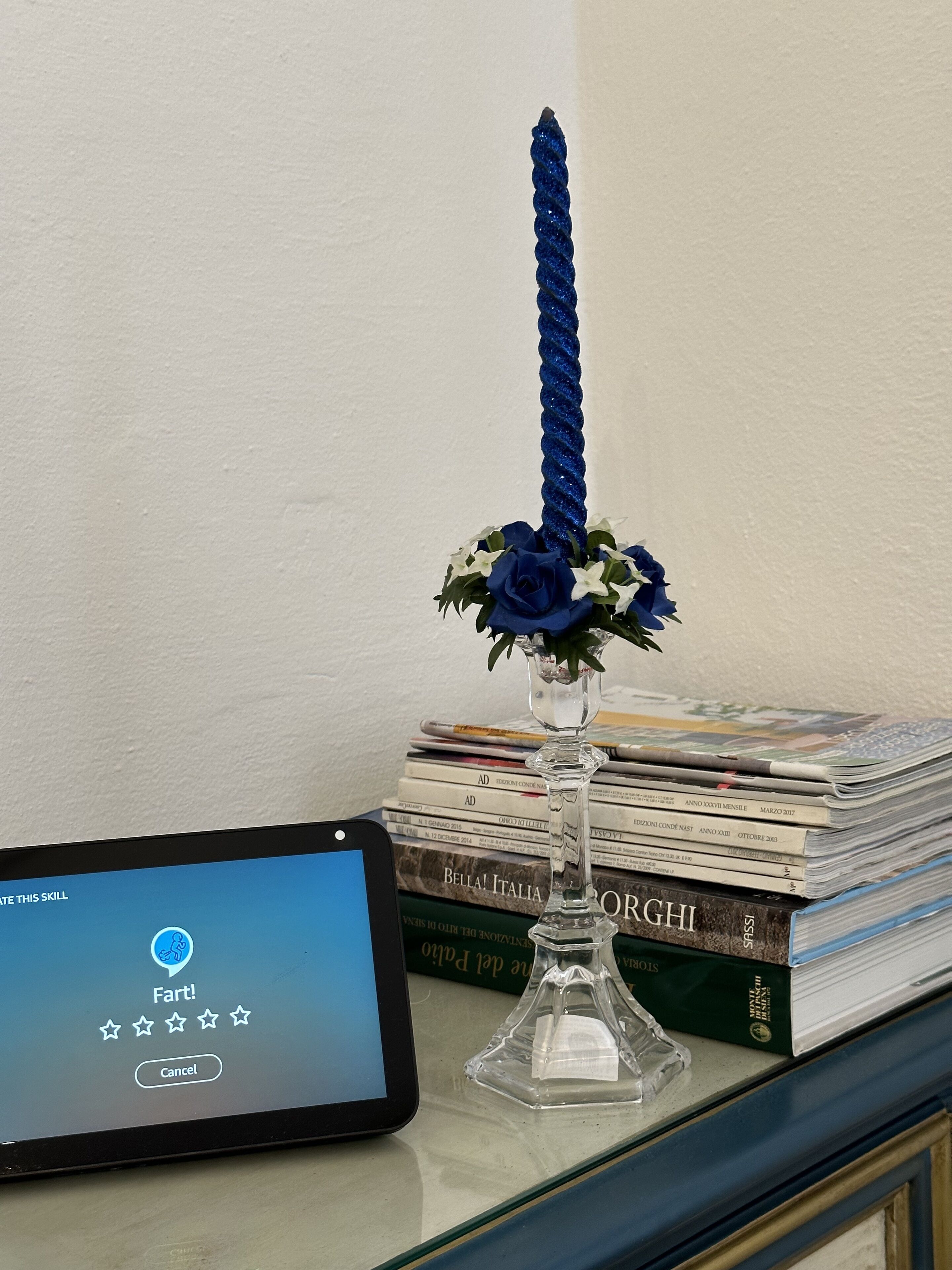 A tablet displaying a rating interface with a rating of 4 stars and a 'Cancel' button.