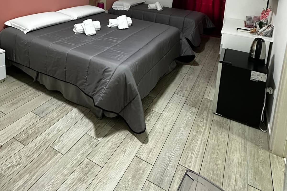 Premium bedding, memory-foam beds, minibar, in-room safe