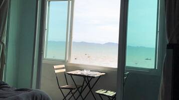 Double Sea View Room | Living area | Flat-screen TV