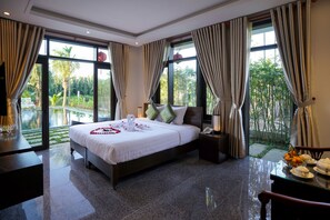 Luxury Suite, Pool View | 1 bedroom, Egyptian cotton sheets, premium bedding, pillow-top beds