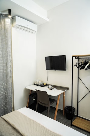 Economy Room, 1 Double Bed | 1 bedroom, in-room safe, desk, soundproofing