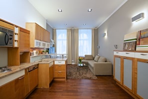 Apartment, 1 Bedroom (Ground Floor) | Living room | 46-inch flat-screen TV with cable channels, TV, Netflix - Holec Apartments (Prague)