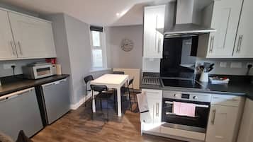 Apartment, 2 Bedrooms | Private kitchen | Fridge, electric kettle