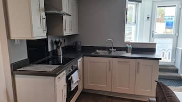 Apartment, 2 Bedrooms | Private kitchen | Fridge, electric kettle