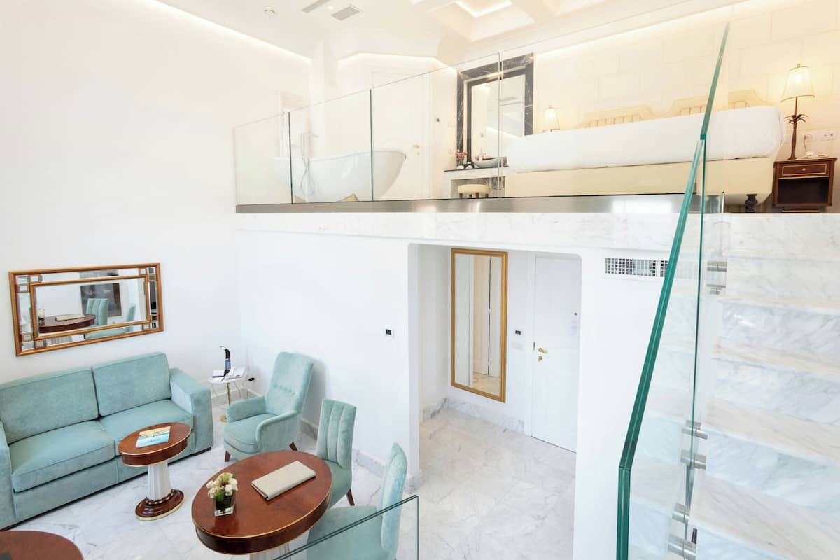 Suite, 1 King Bed, Non Smoking, Sea View | 1 bedroom, premium bedding, minibar, in-room safe