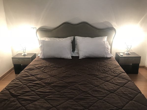 2 bedrooms, premium bedding, blackout curtains, iron/ironing board