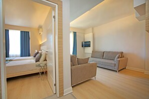 Apartment, 1 Bedroom | Living area | LCD TV