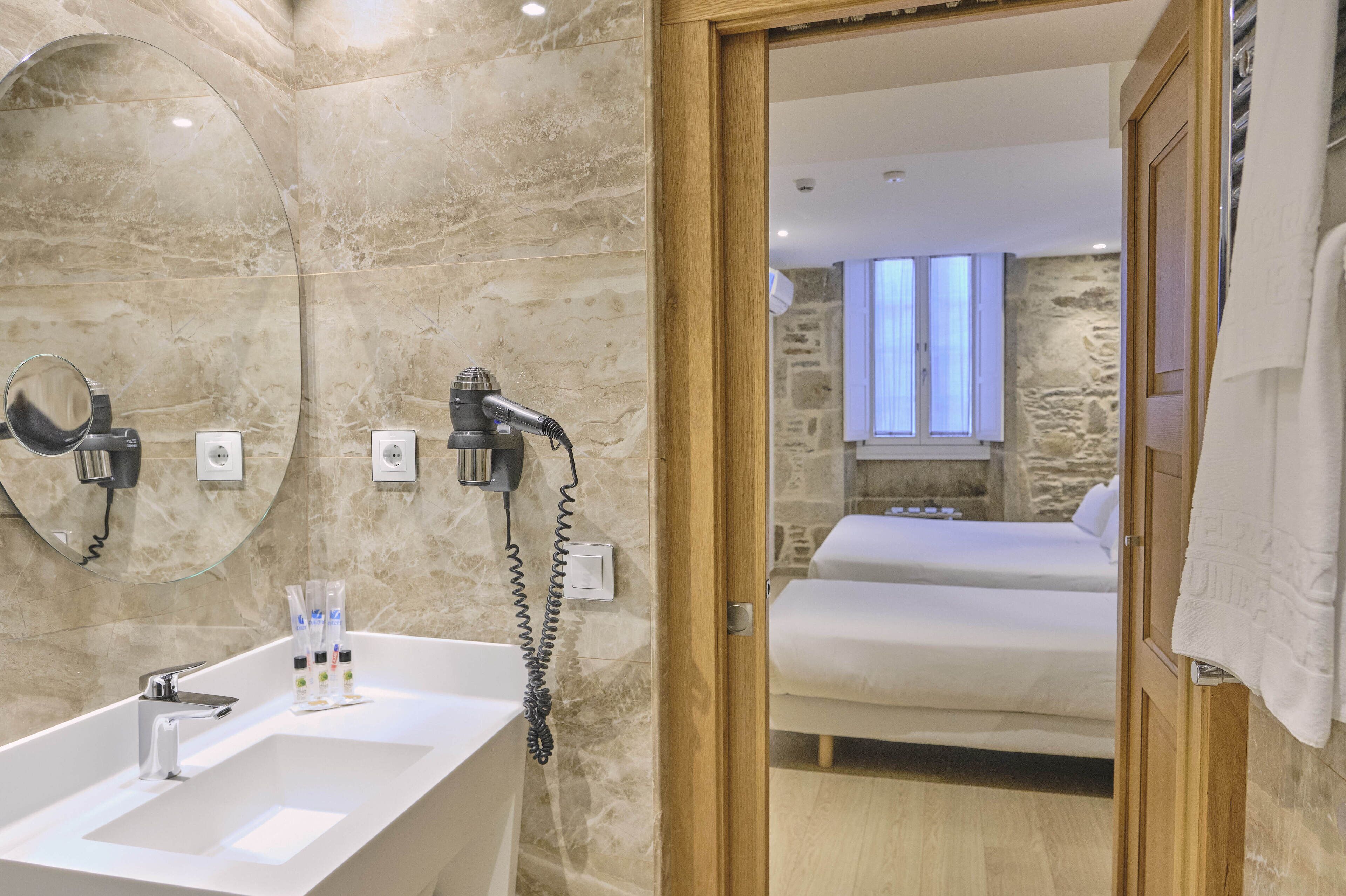 double room (with extra bed) | bathroom | free toiletries, hair dryer, towels