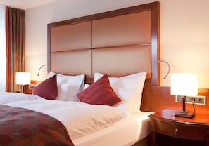 Luxe beddengoed, een kluis op de kamer, een bureau, gratis wifi