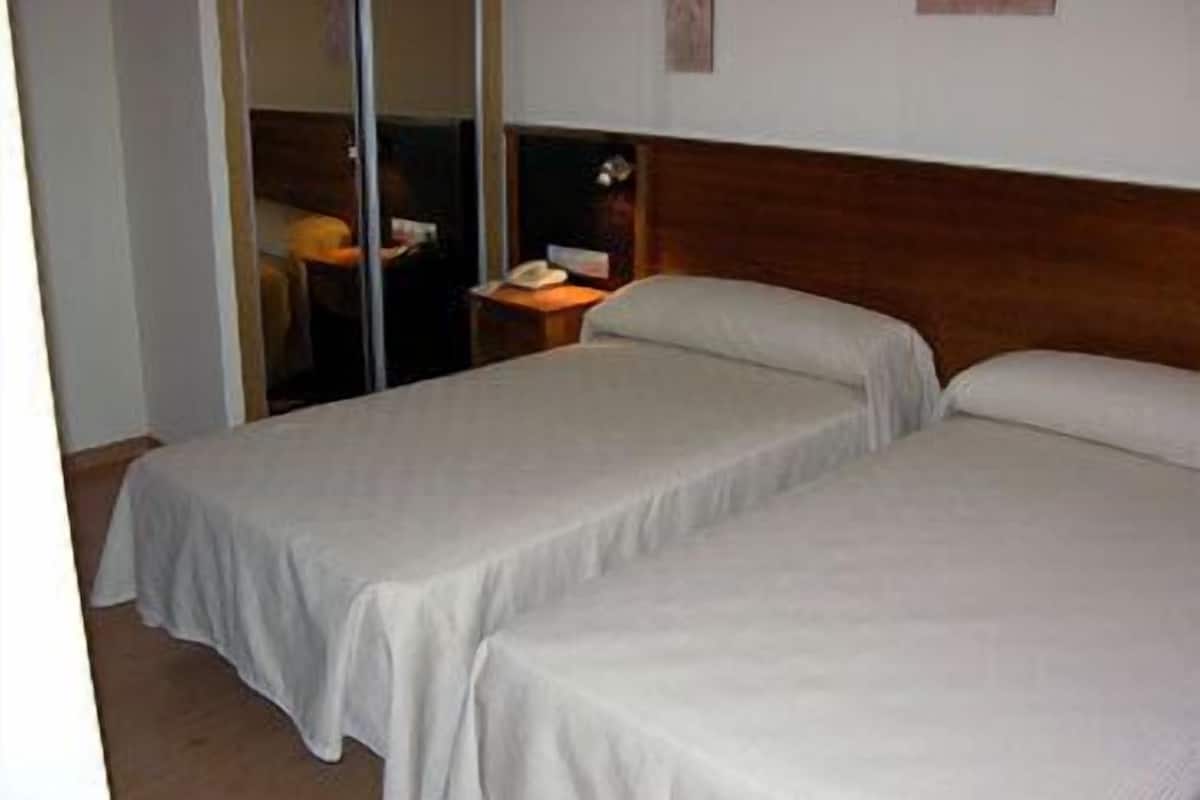 double or twin room | desk, blackout curtains, iron/ironing board, free cots/infant beds