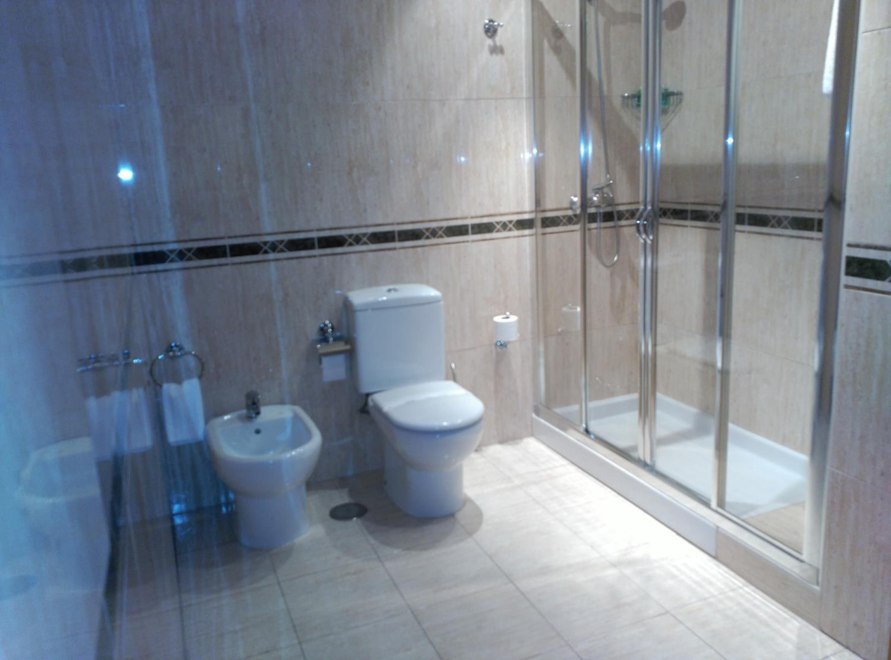 free toiletries, hair dryer, bidet, towels