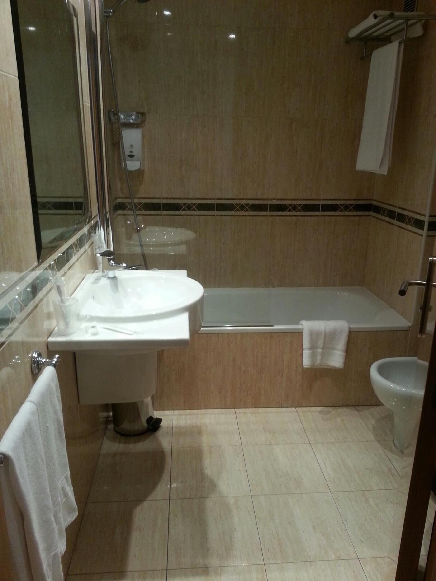 free toiletries, hair dryer, bidet, towels