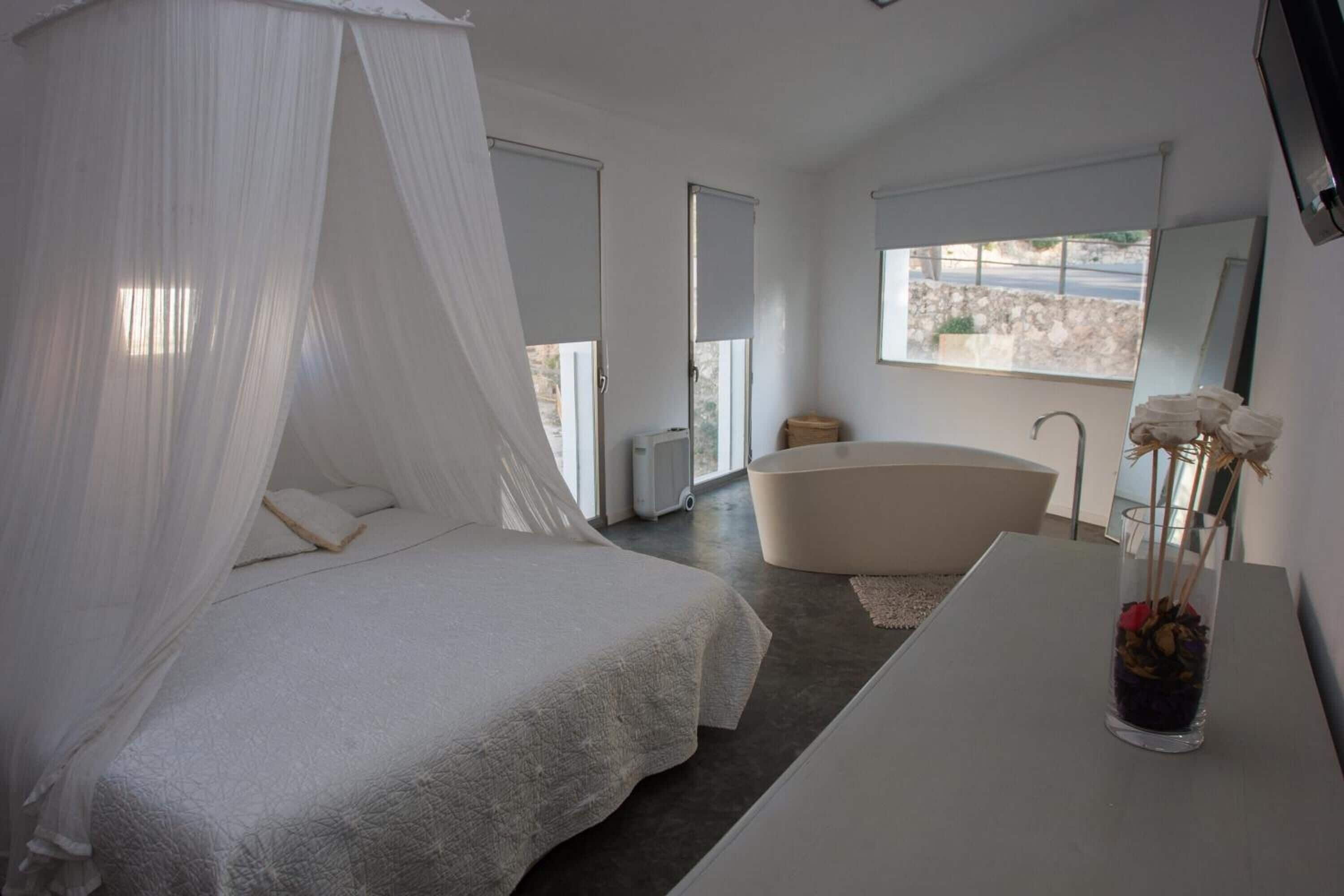 Blackout drapes, soundproofing, free WiFi, bed sheets