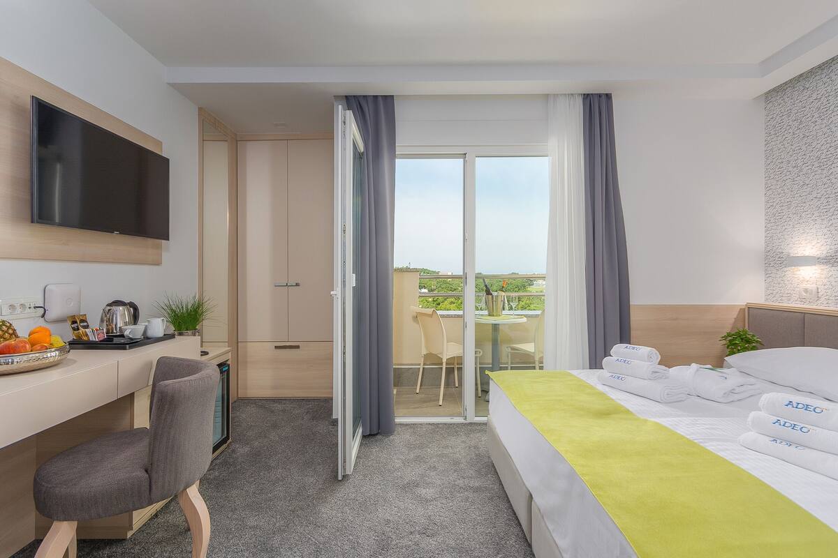 1 habitación, ropa de cama de alta calidad y minibar