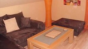 Condo, 2 chambres | Aire de séjour