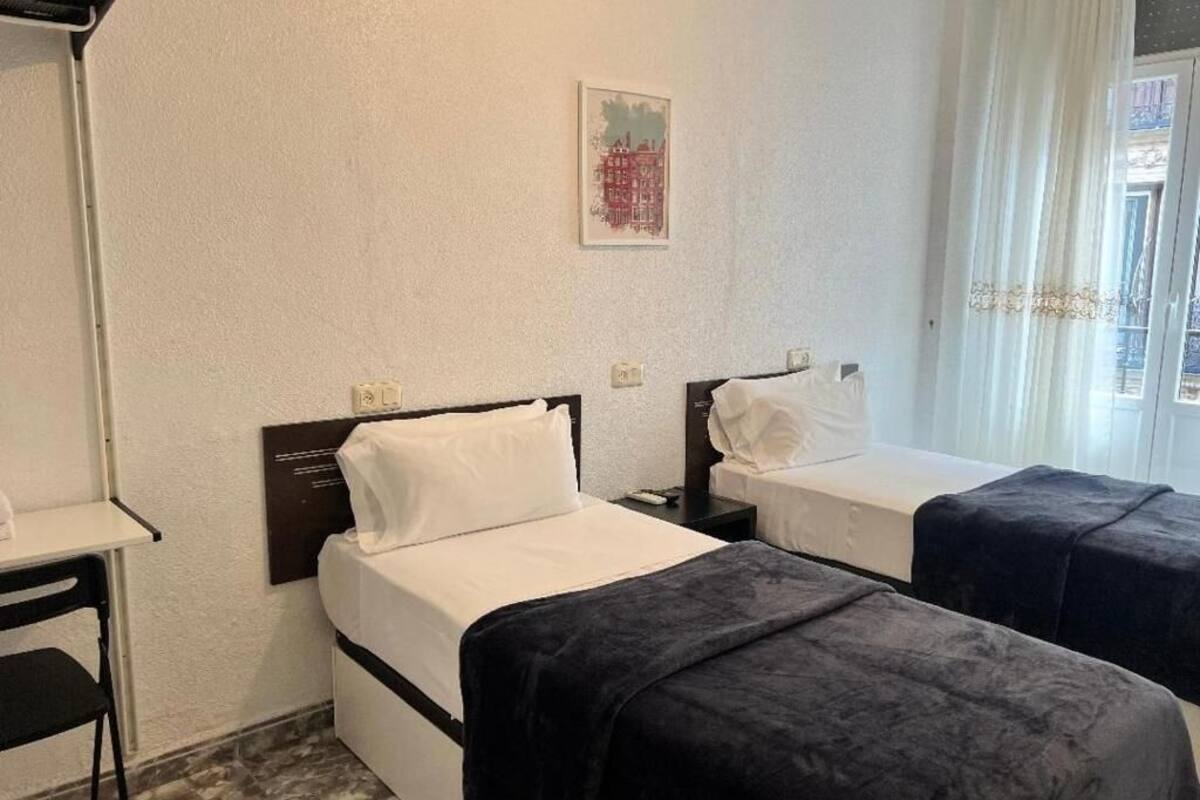 Desk, free WiFi, bed sheets