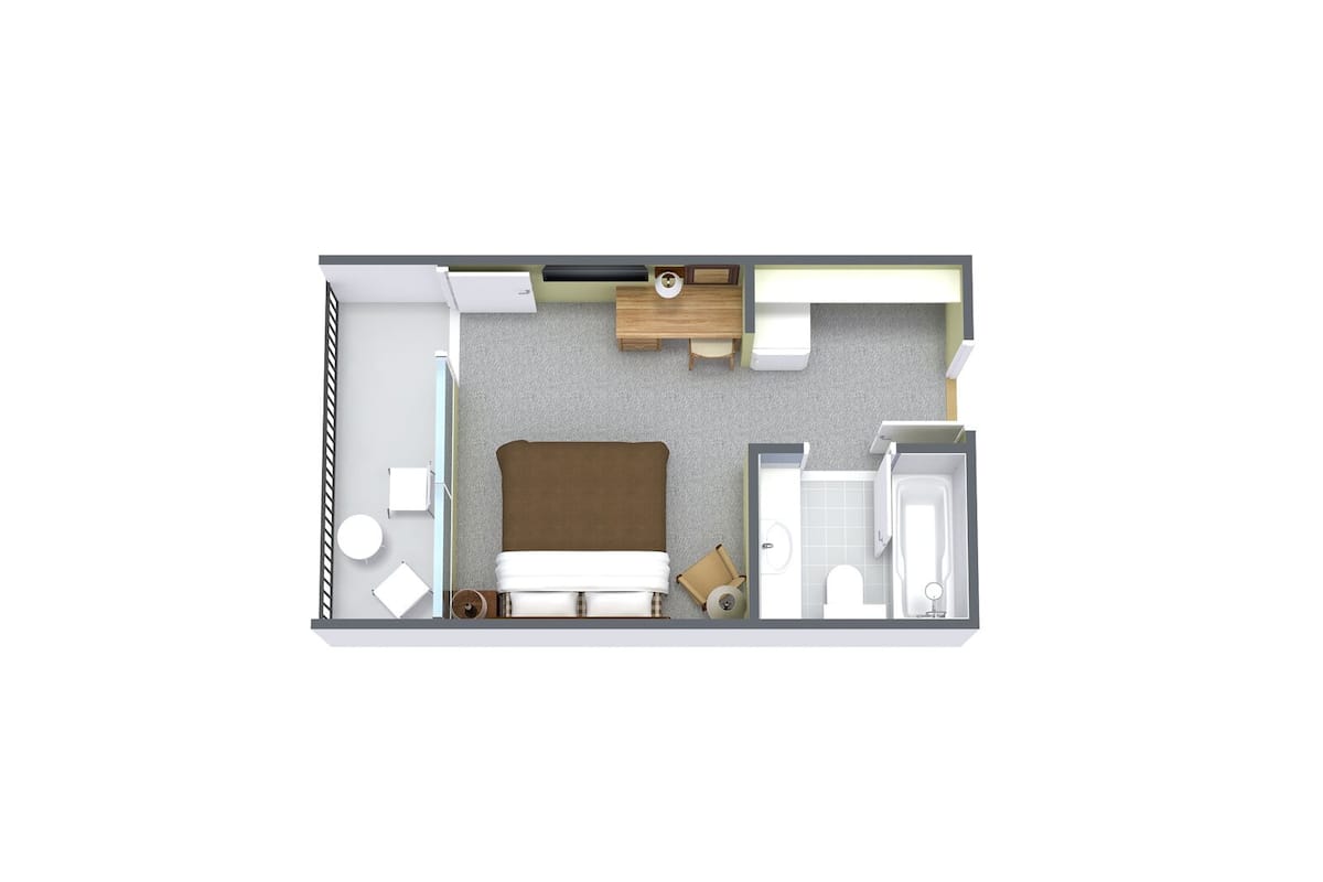A 1-bedroom apartment with a bed, a small kitchenette, a bathroom, and a living area.