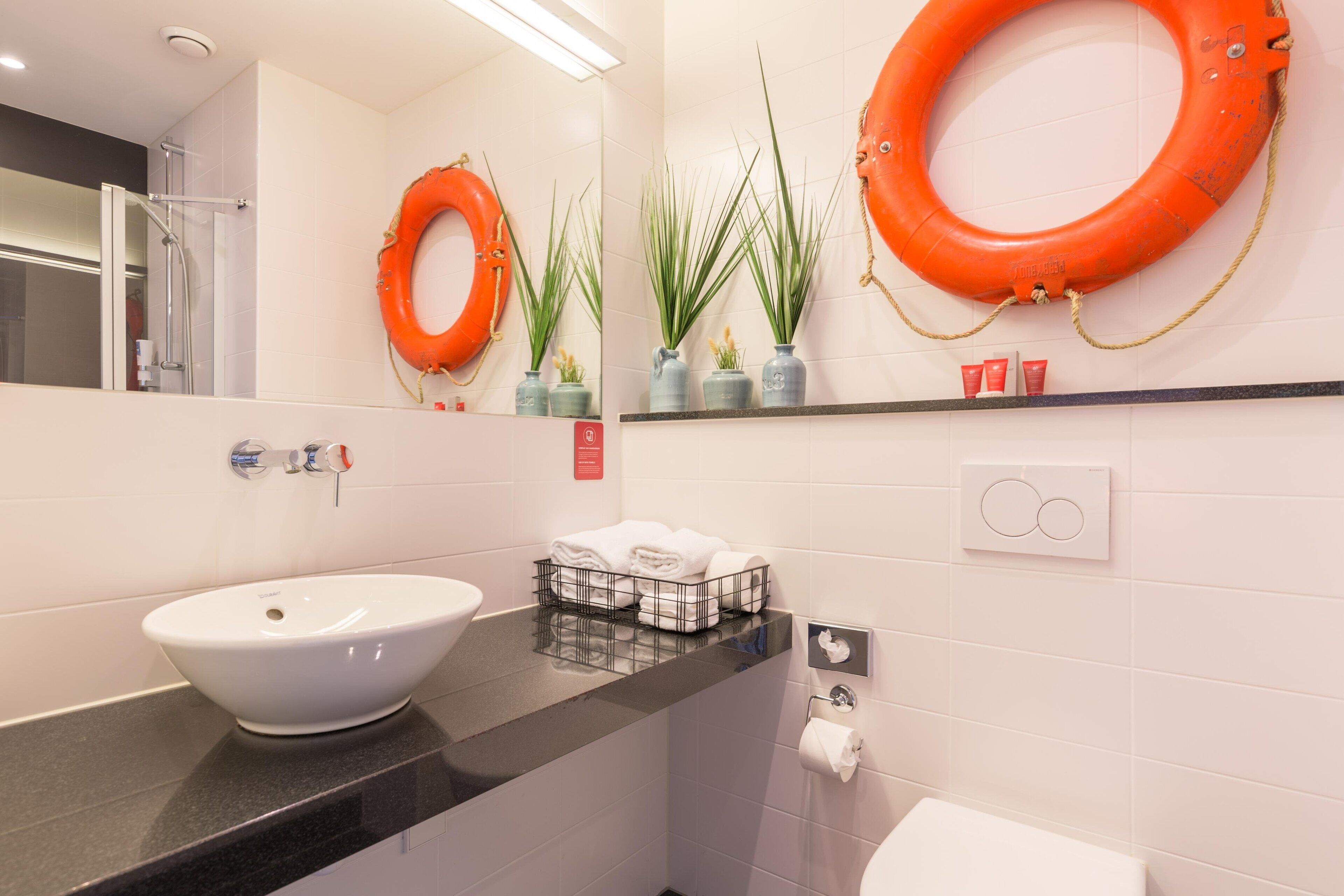 shower, eco-friendly toiletries, hair dryer, towels