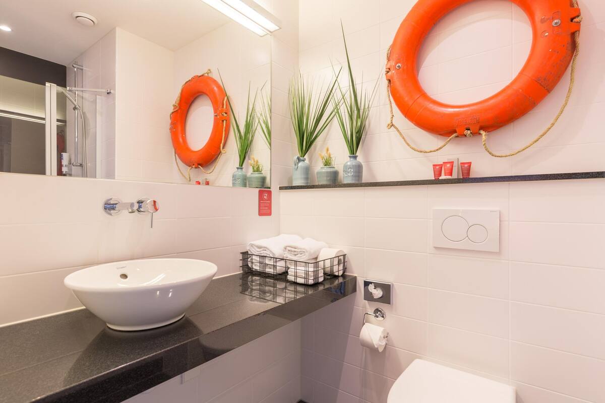 shower, eco-friendly toiletries, hair dryer, towels