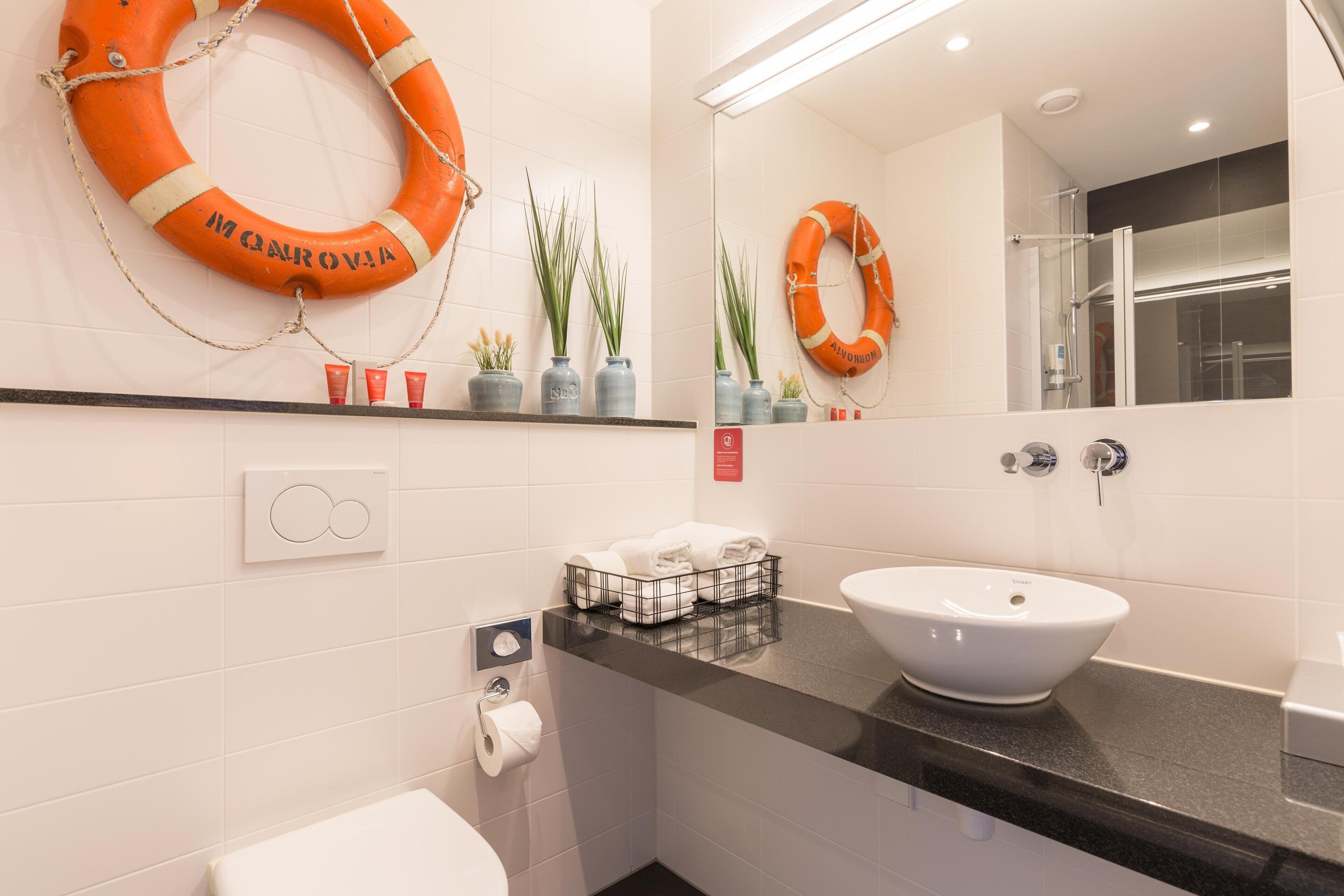 shower, eco-friendly toiletries, hair dryer, towels