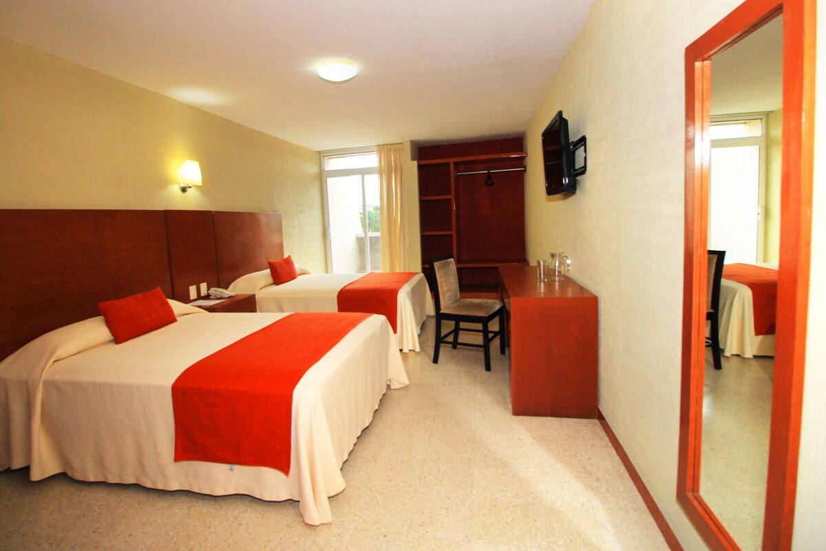 Premium bedding, desk, laptop workspace, iron/ironing board (on request)