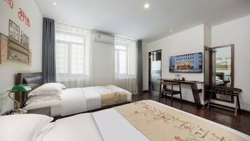 Classic Twin Room | Down comforters, desk, blackout drapes, iron/ironing board