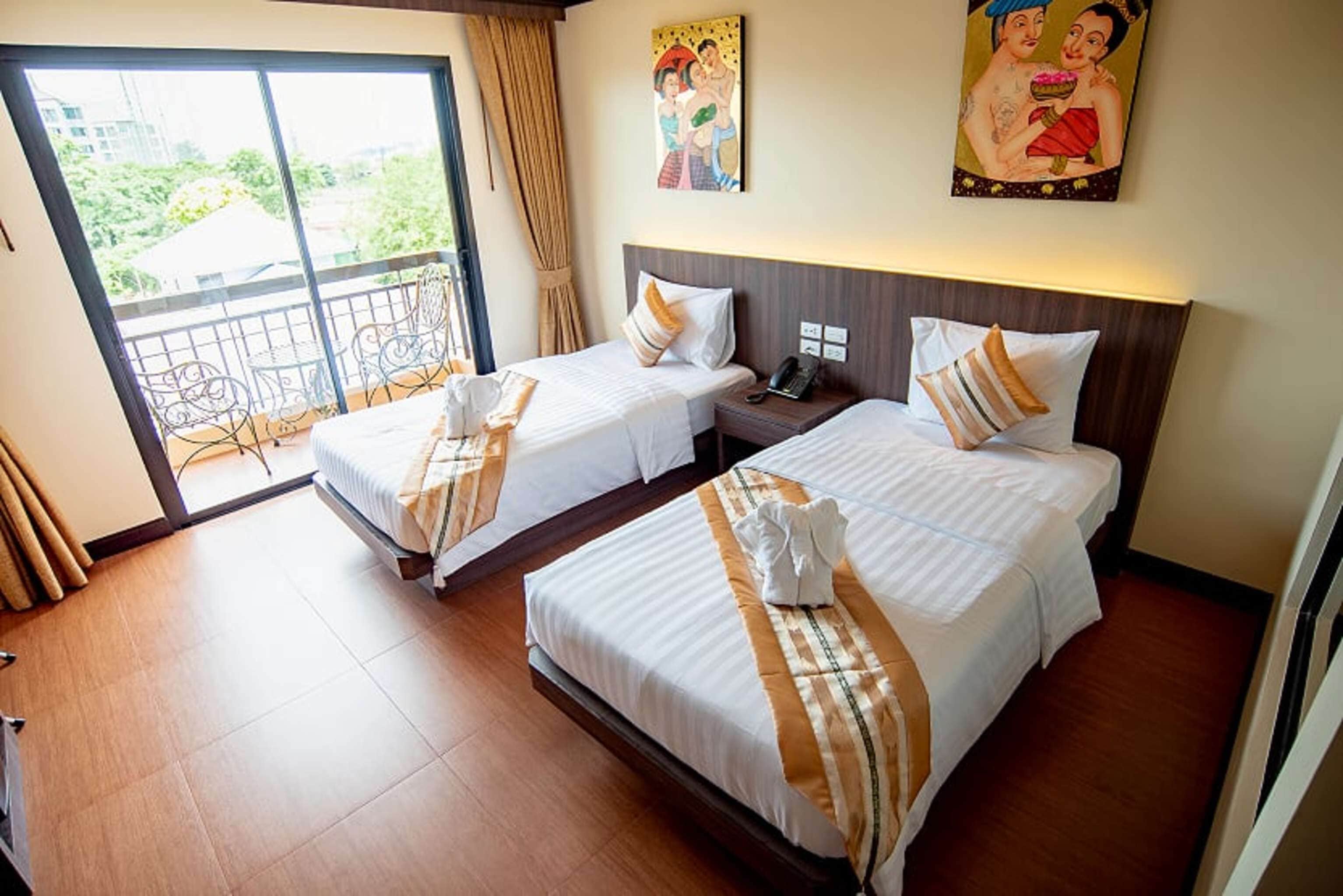 superior twin room | 1 bedroom, in-room safe, desk, blackout curtains