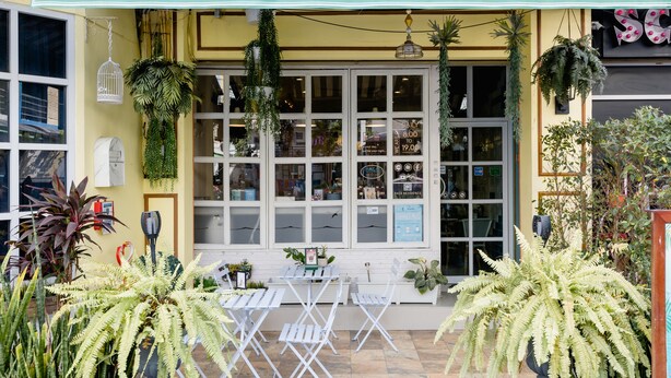 A coffee bar with a sign reading "PACE RESIDENCE x COFFEE BAR". - Pace Residence Pattaya (Pattaya)