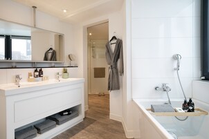 Eco-friendly toiletries, hair dryer, towels, soap