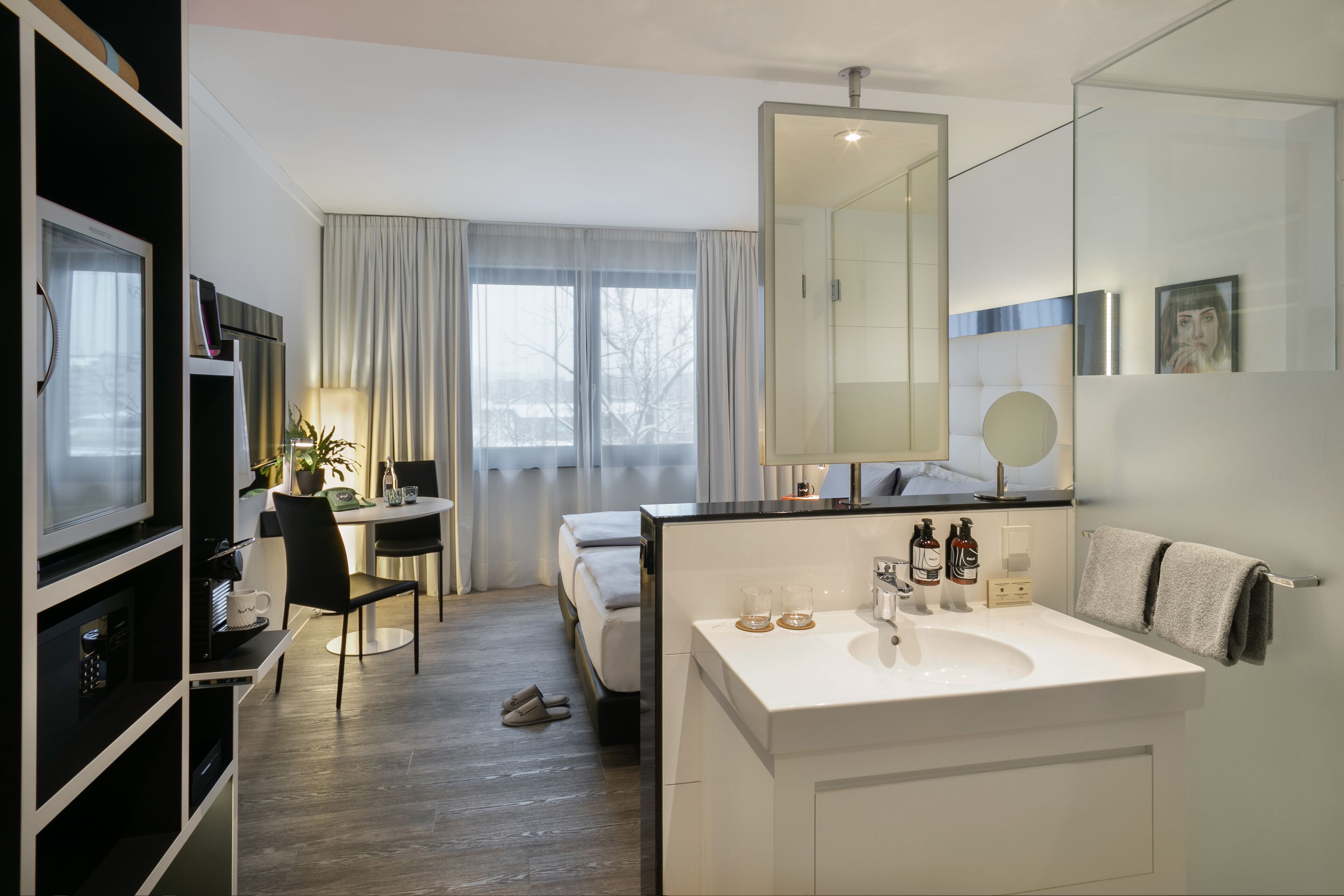 the innside premium room | bathroom | shower, rainfall showerhead, eco-friendly toiletries, hair dryer