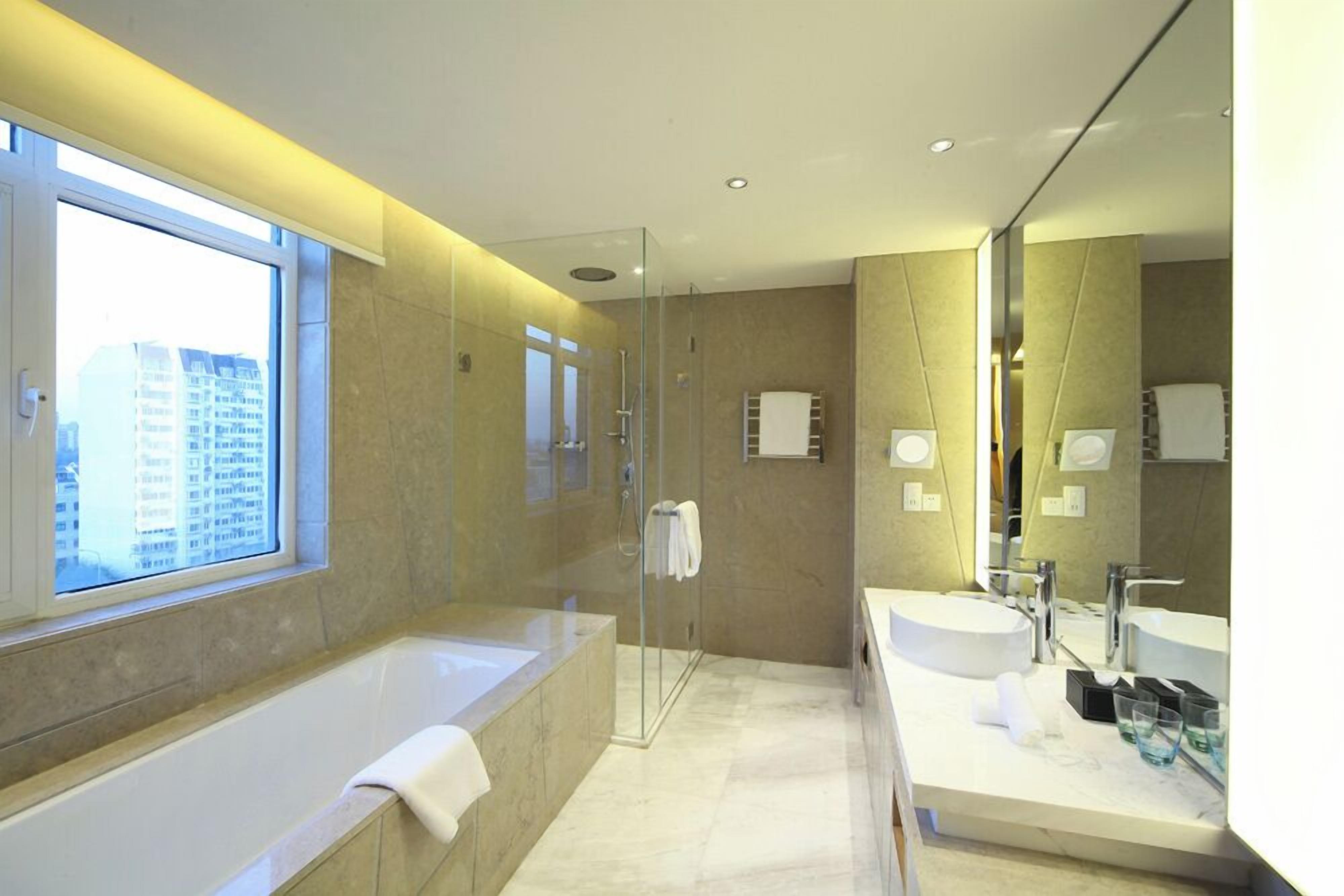 bamboo suite | bathroom | separate bathtub and shower, free toiletries, hair dryer, bathrobes